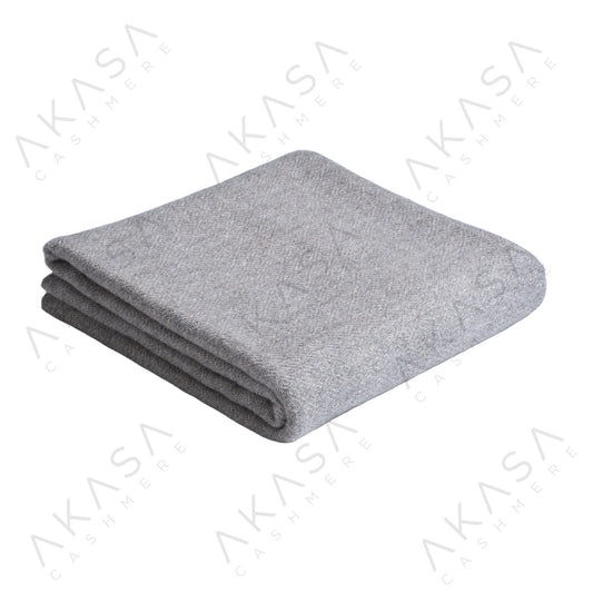 Custom cashmere blanket inspired by Himalayan heritage, crafted with traditional craftsmanship and modern luxury