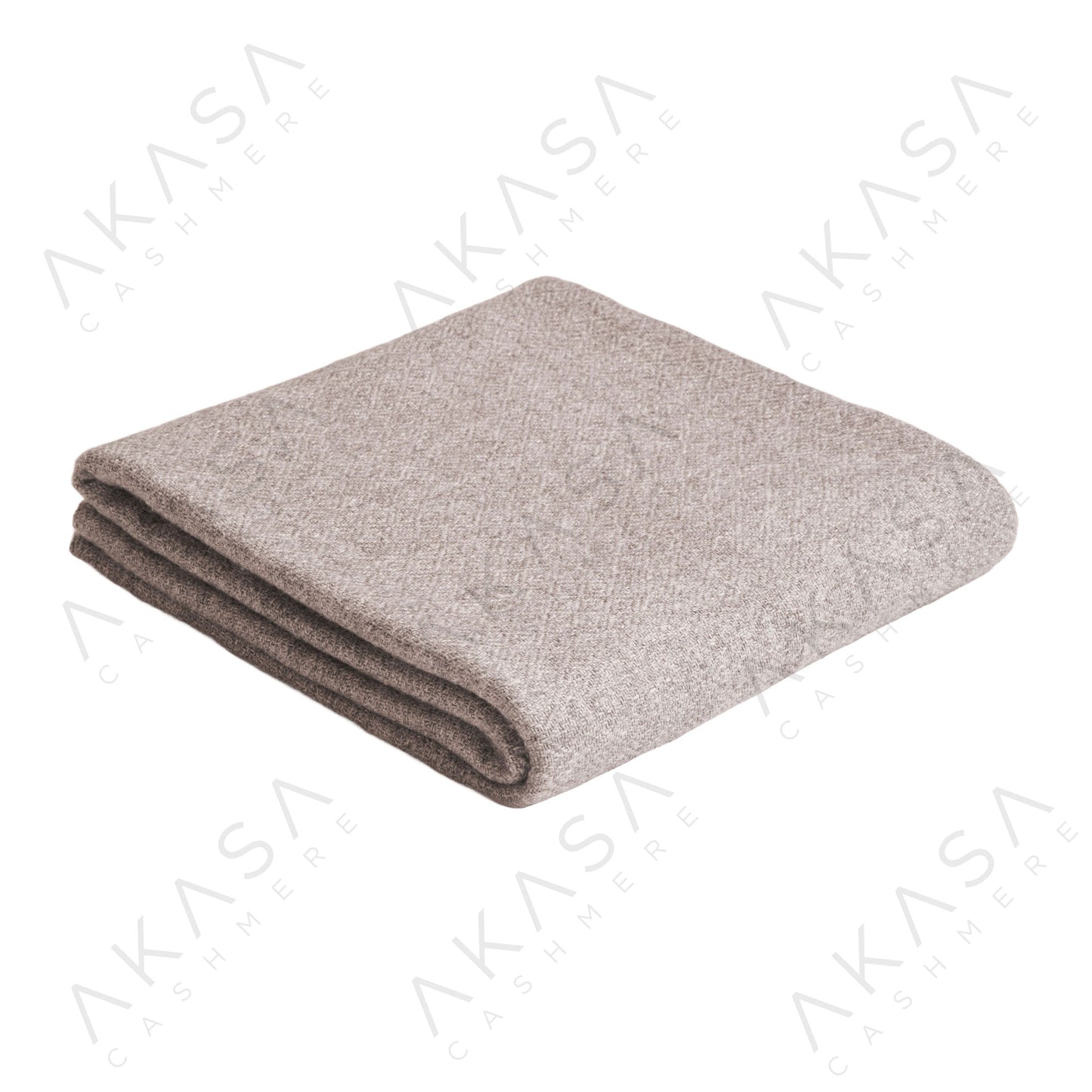 Custom cashmere blanket inspired by Himalayan heritage, crafted with traditional craftsmanship and modern luxury