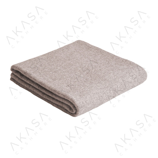 Custom cashmere blanket inspired by Himalayan heritage, crafted with traditional craftsmanship and modern luxury