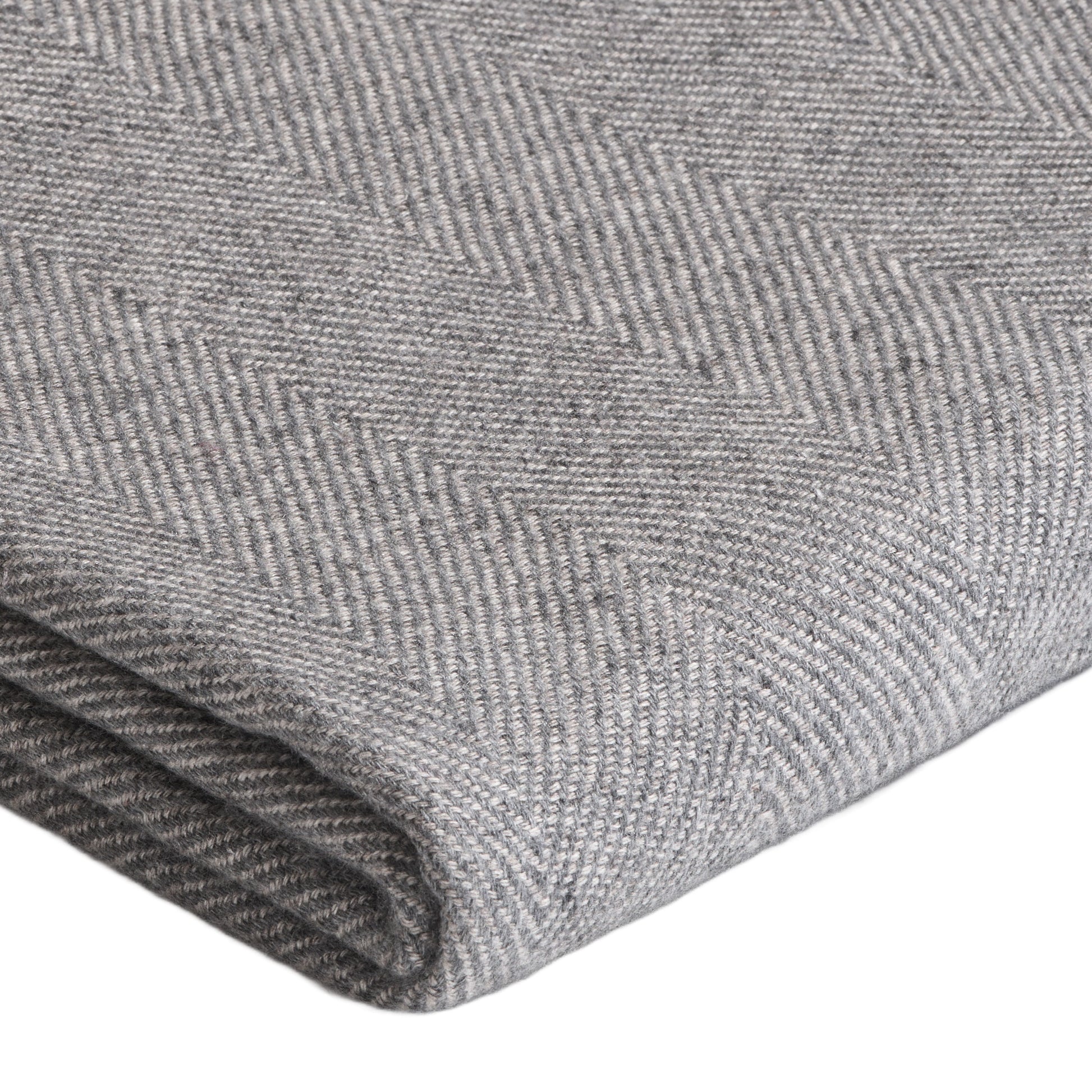 Custom cashmere blanket inspired by Himalayan heritage, crafted with traditional craftsmanship and modern luxury