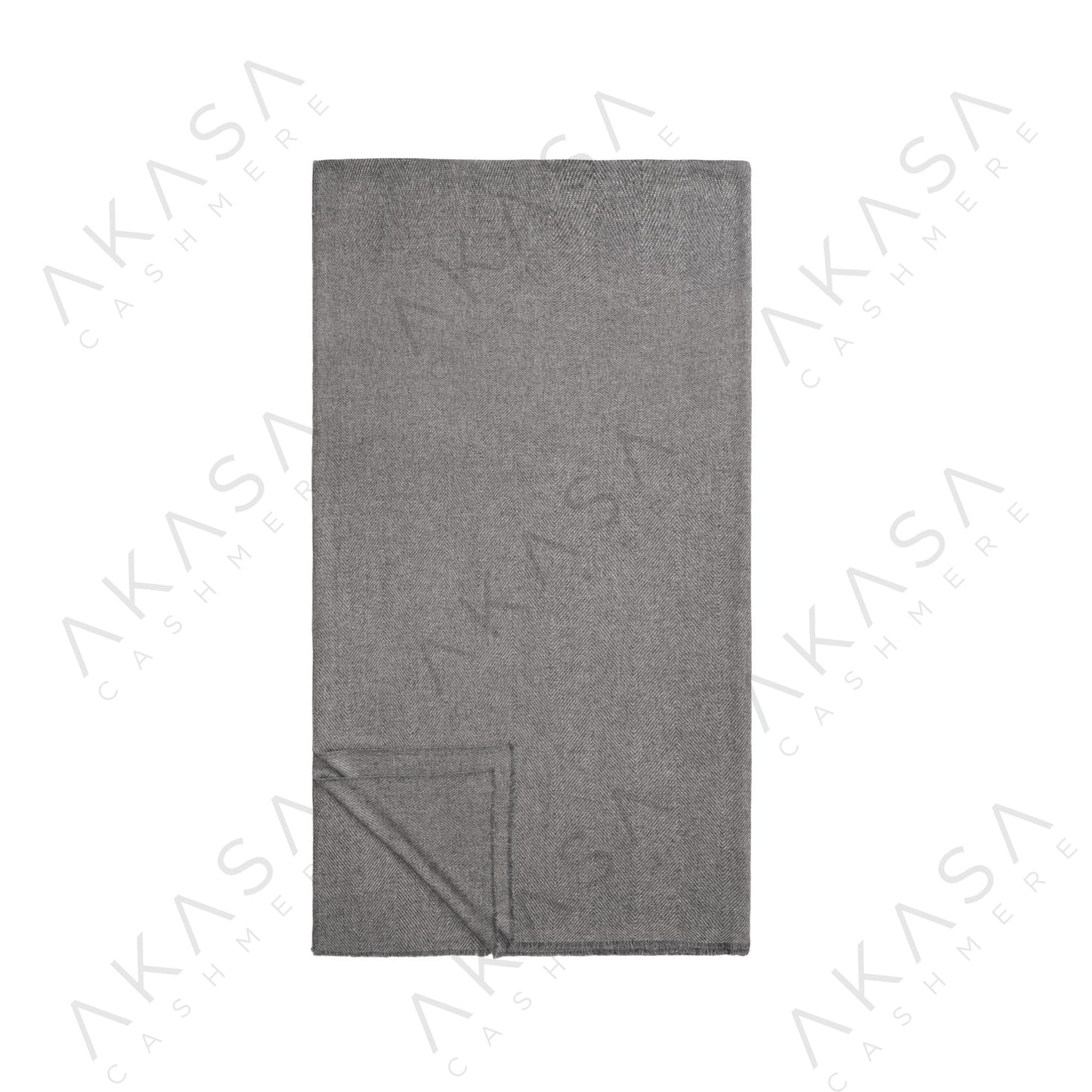 Custom cashmere blanket inspired by Himalayan heritage, crafted with traditional craftsmanship and modern luxury