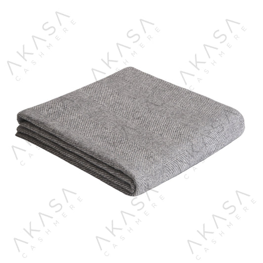 Custom cashmere blanket inspired by Himalayan heritage, crafted with traditional craftsmanship and modern luxury