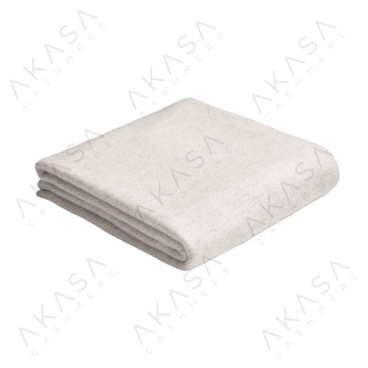 Custom cashmere blanket inspired by Himalayan heritage, crafted with traditional craftsmanship and modern luxury