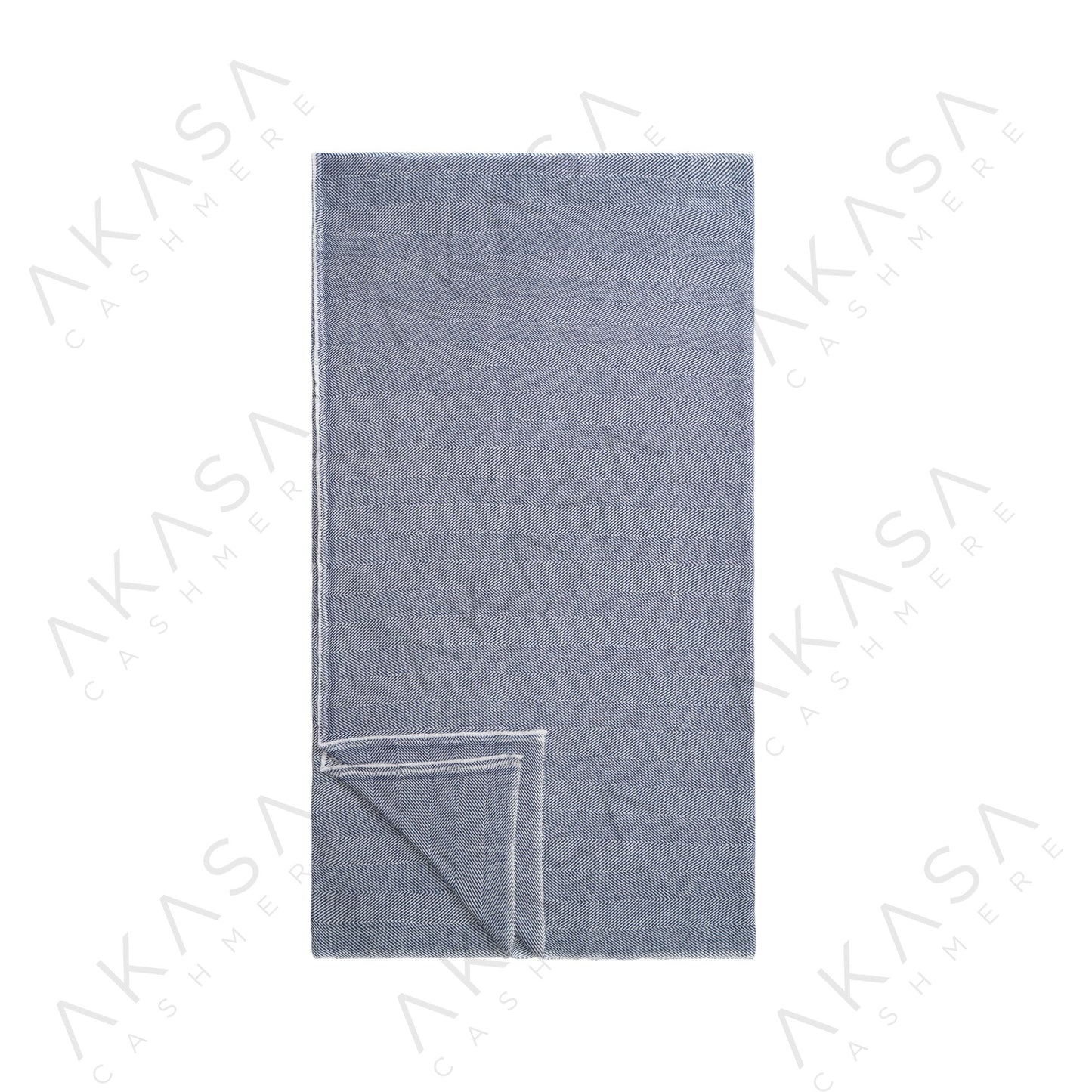 Custom cashmere blanket inspired by Himalayan heritage, crafted with traditional craftsmanship and modern luxury