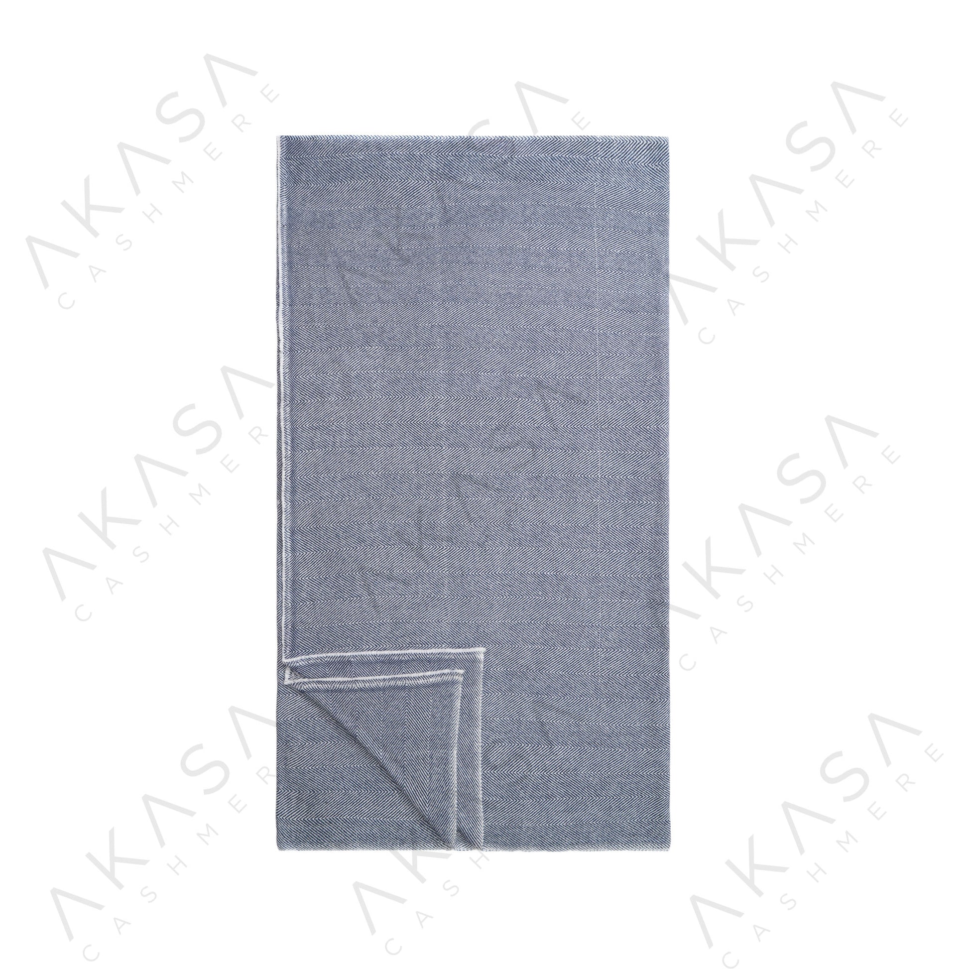 Custom cashmere blanket inspired by Himalayan heritage, crafted with traditional craftsmanship and modern luxury