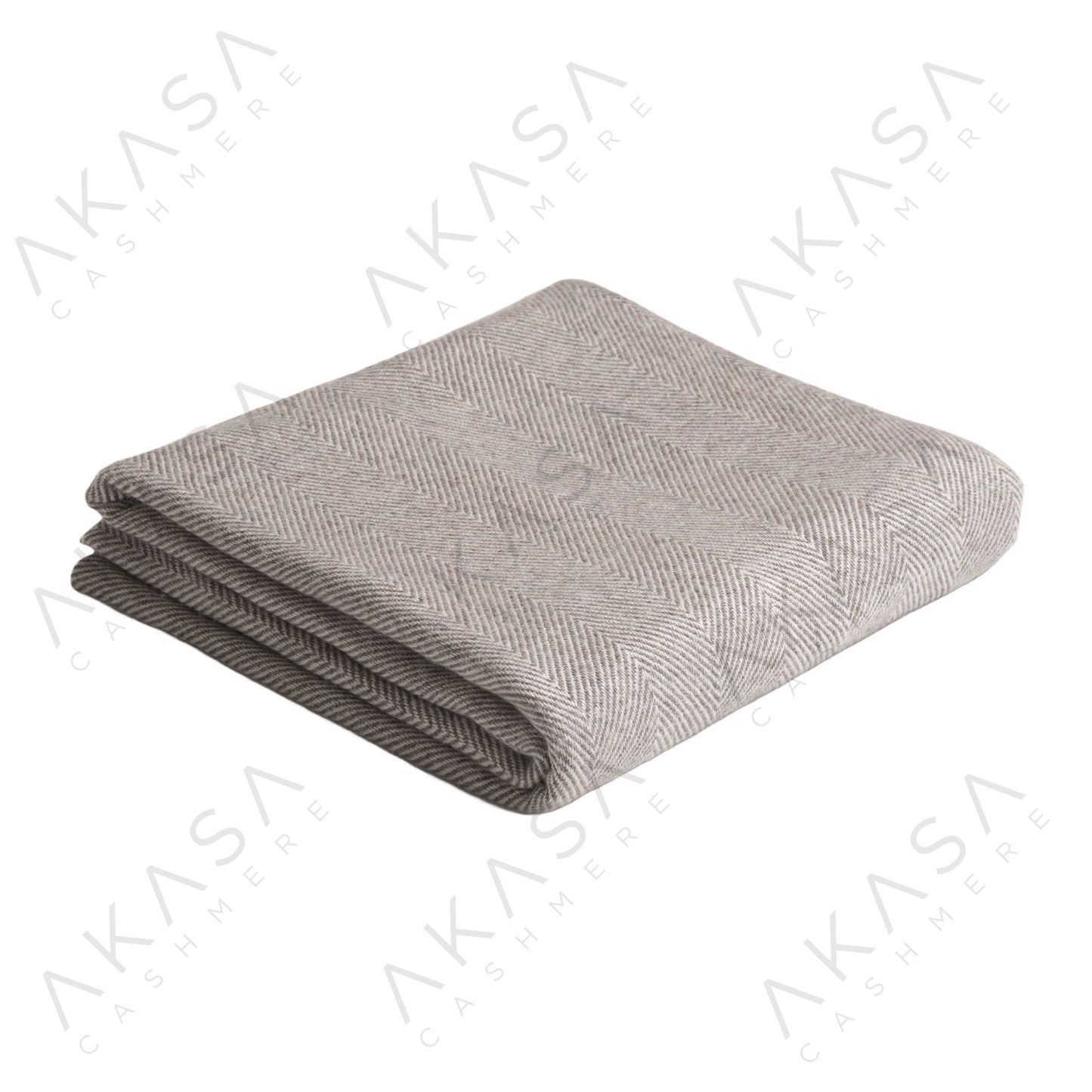 Custom cashmere blanket inspired by Himalayan heritage, crafted with traditional craftsmanship and modern luxury