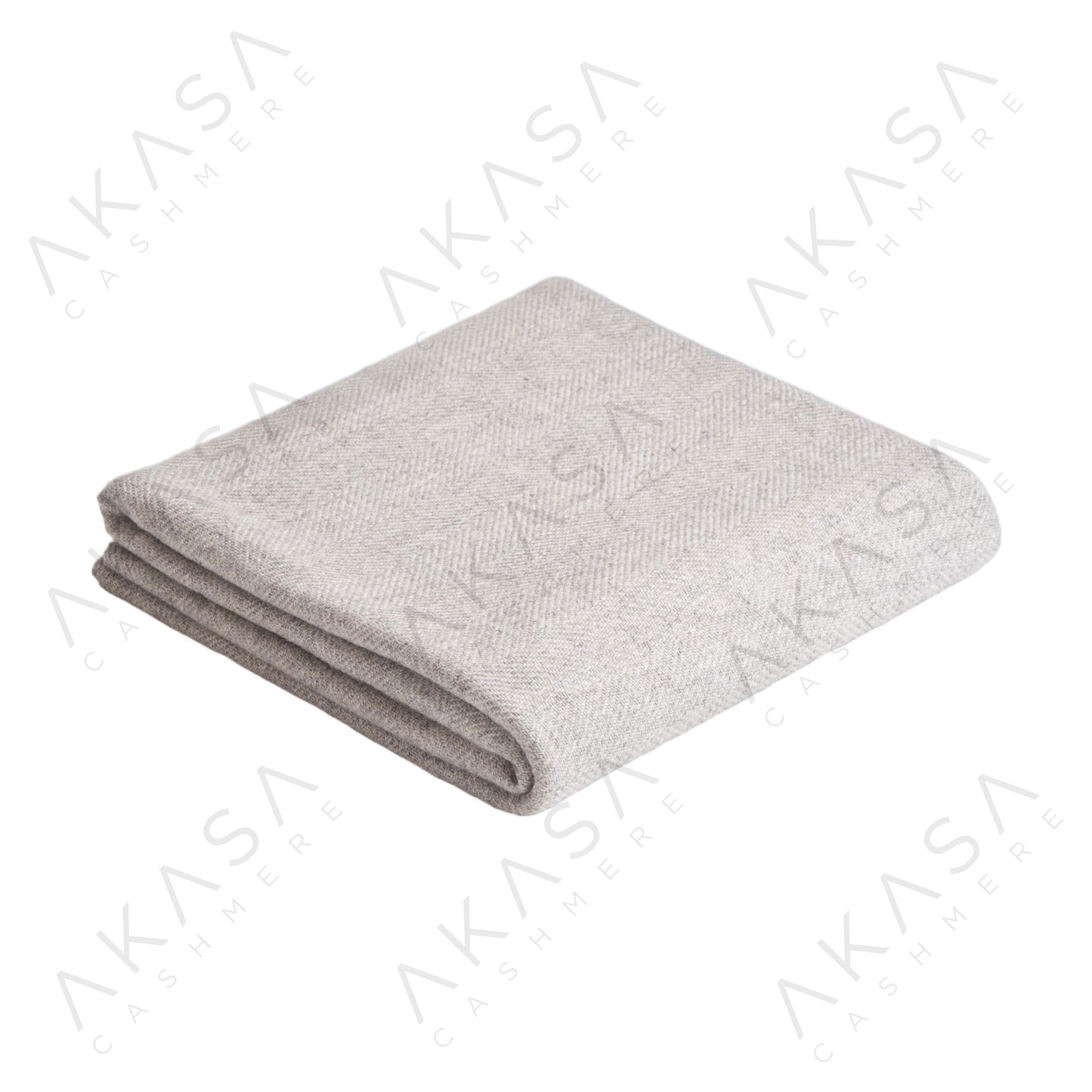 Custom cashmere blanket inspired by Himalayan heritage, crafted with traditional craftsmanship and modern luxury