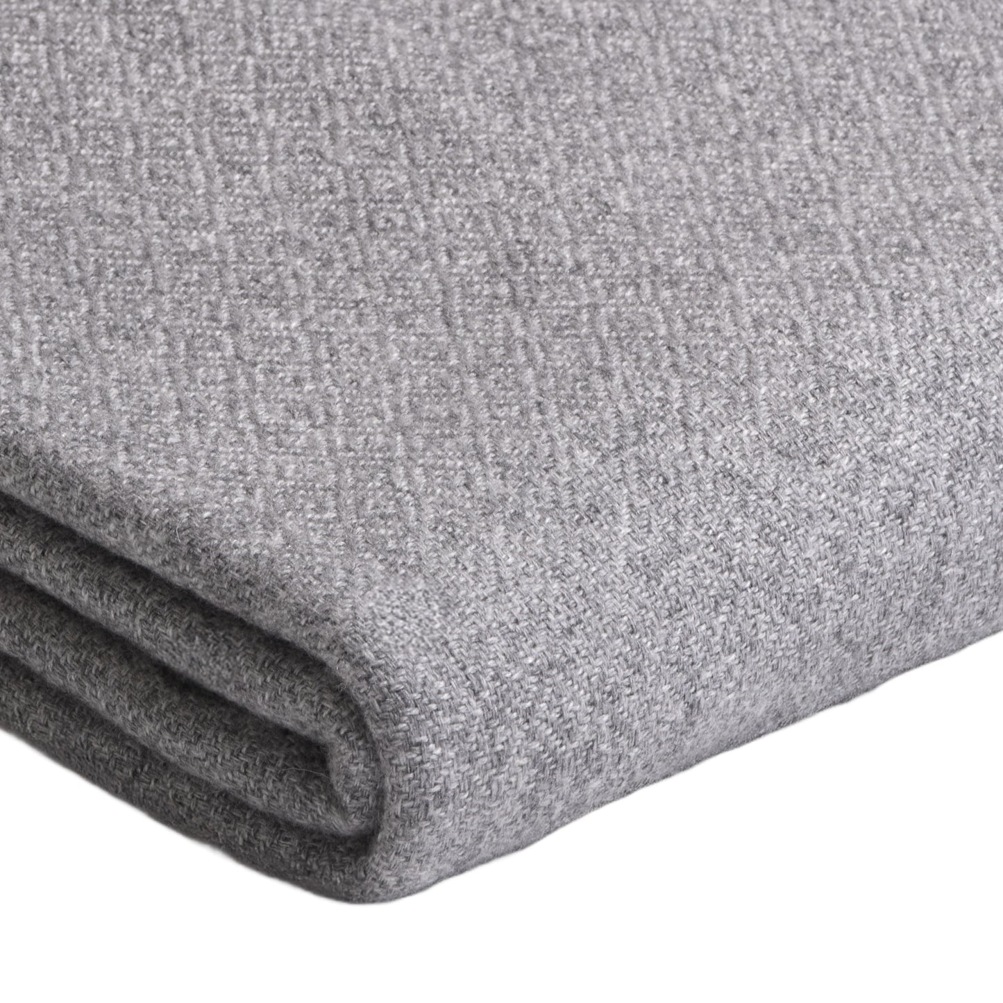 Custom cashmere blanket inspired by Himalayan heritage, crafted with traditional craftsmanship and modern luxury