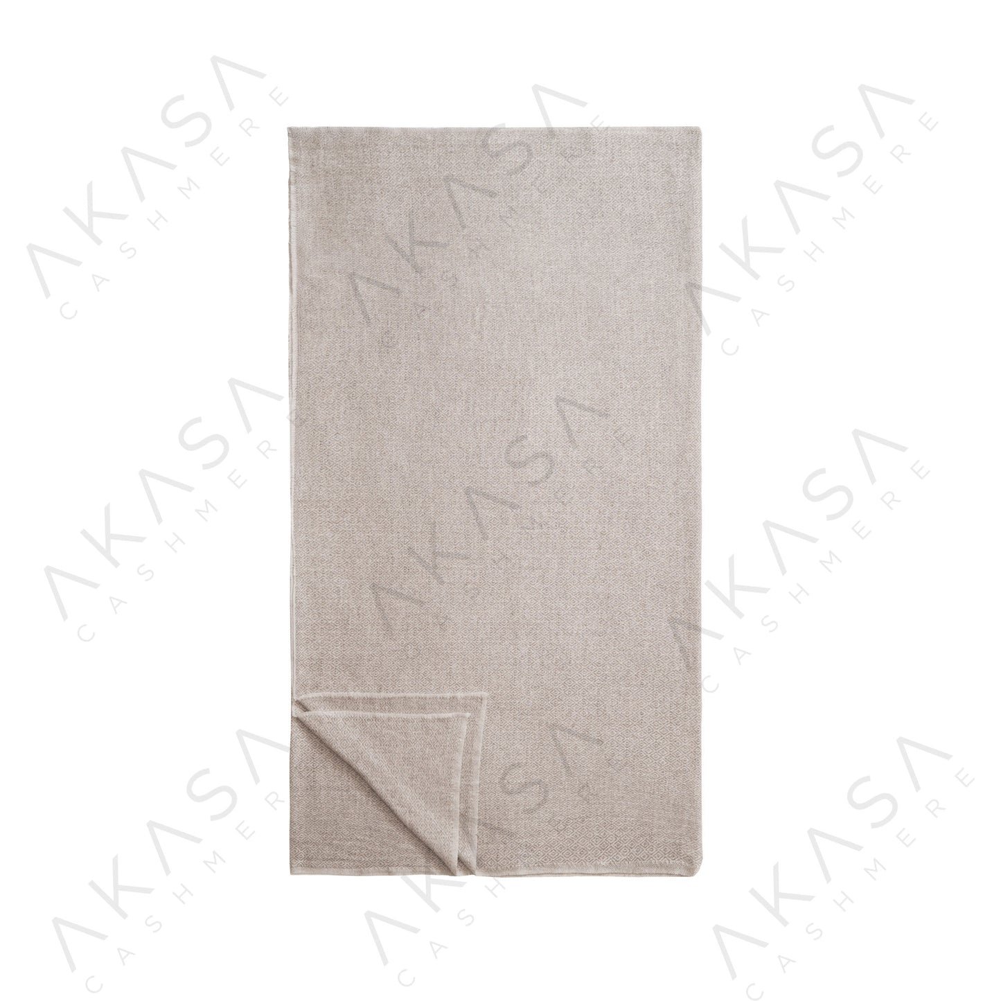 Custom cashmere blanket inspired by Himalayan heritage, crafted with traditional craftsmanship and modern luxury