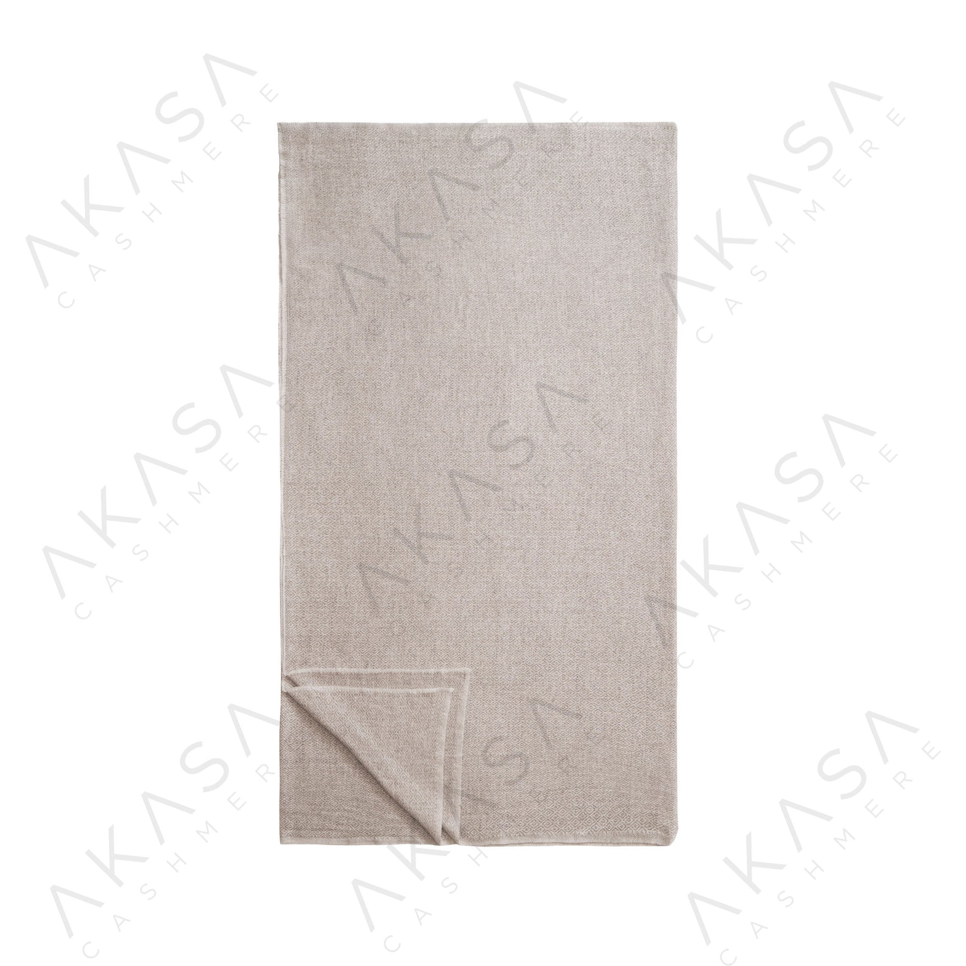 Custom cashmere blanket inspired by Himalayan heritage, crafted with traditional craftsmanship and modern luxury