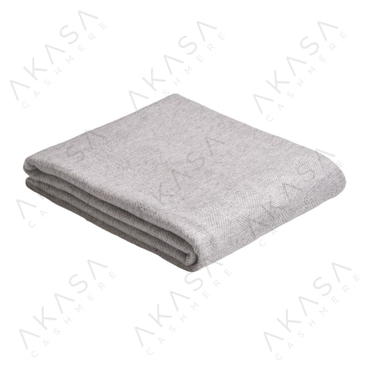 Custom cashmere blanket inspired by Himalayan heritage, crafted with traditional craftsmanship and modern luxury